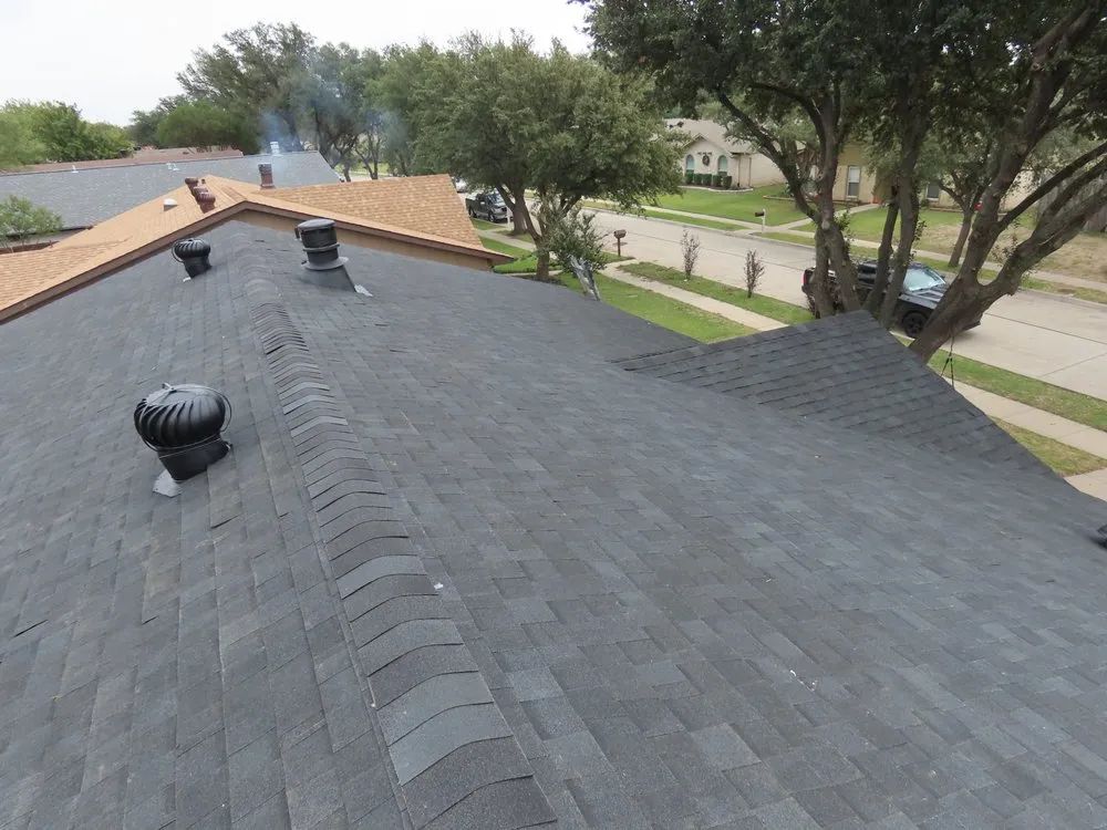 Slide of Solotzo Roofing