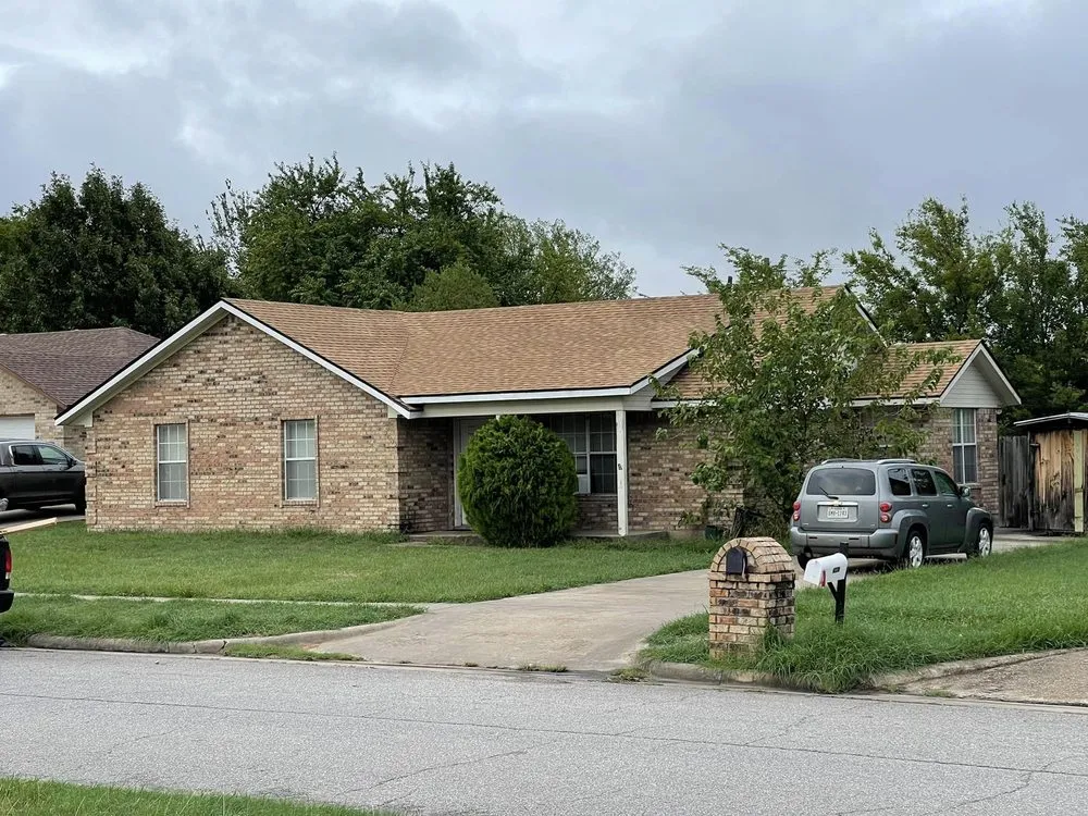 Slide of Solotzo Roofing