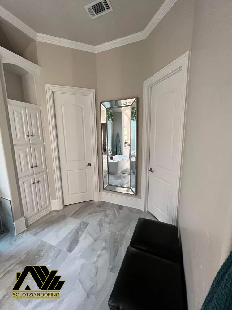 Slide of Solotzo Roofing