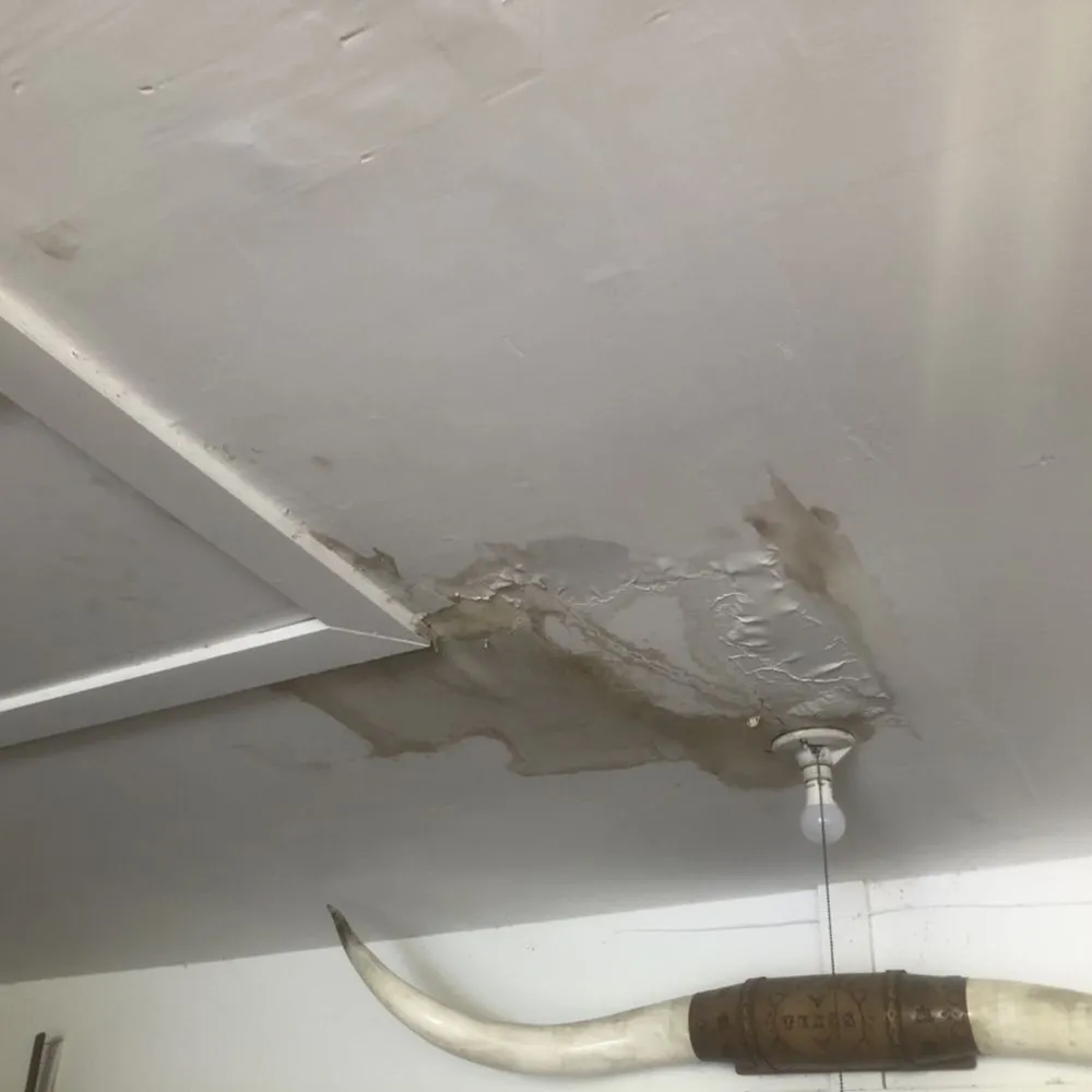 Slide of Solutions Roofing and Building