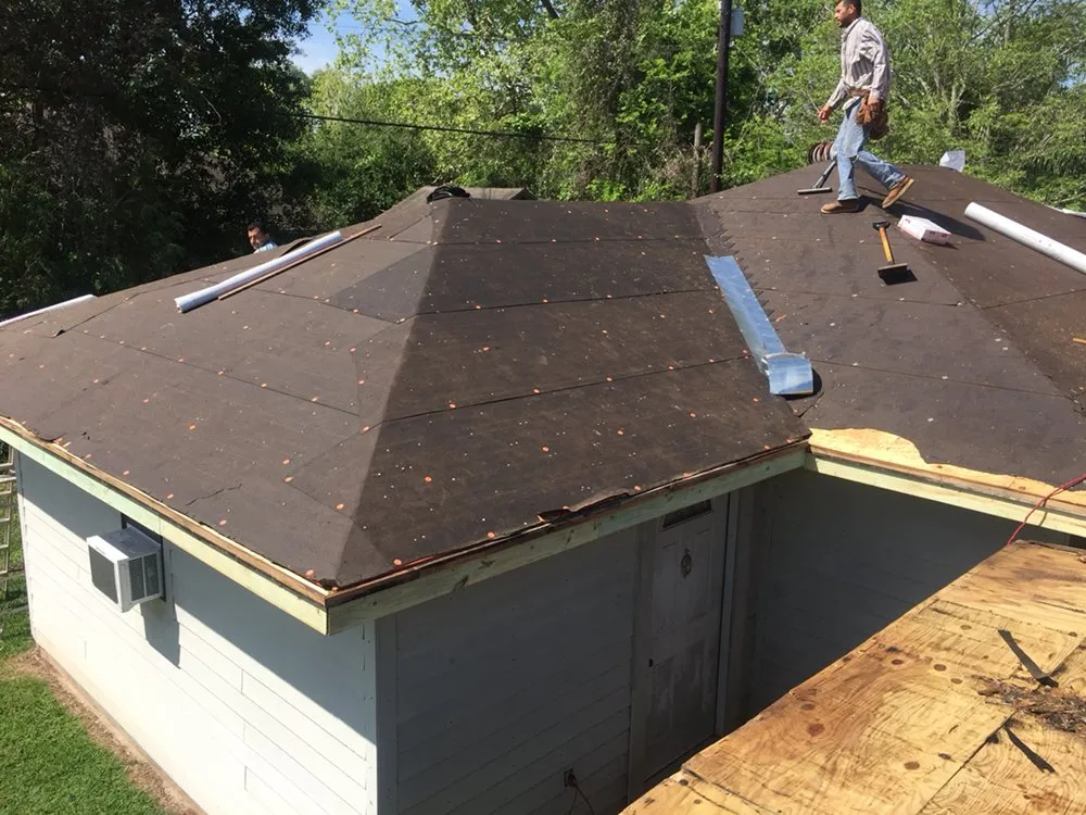 Slide of Solutions Roofing and Building