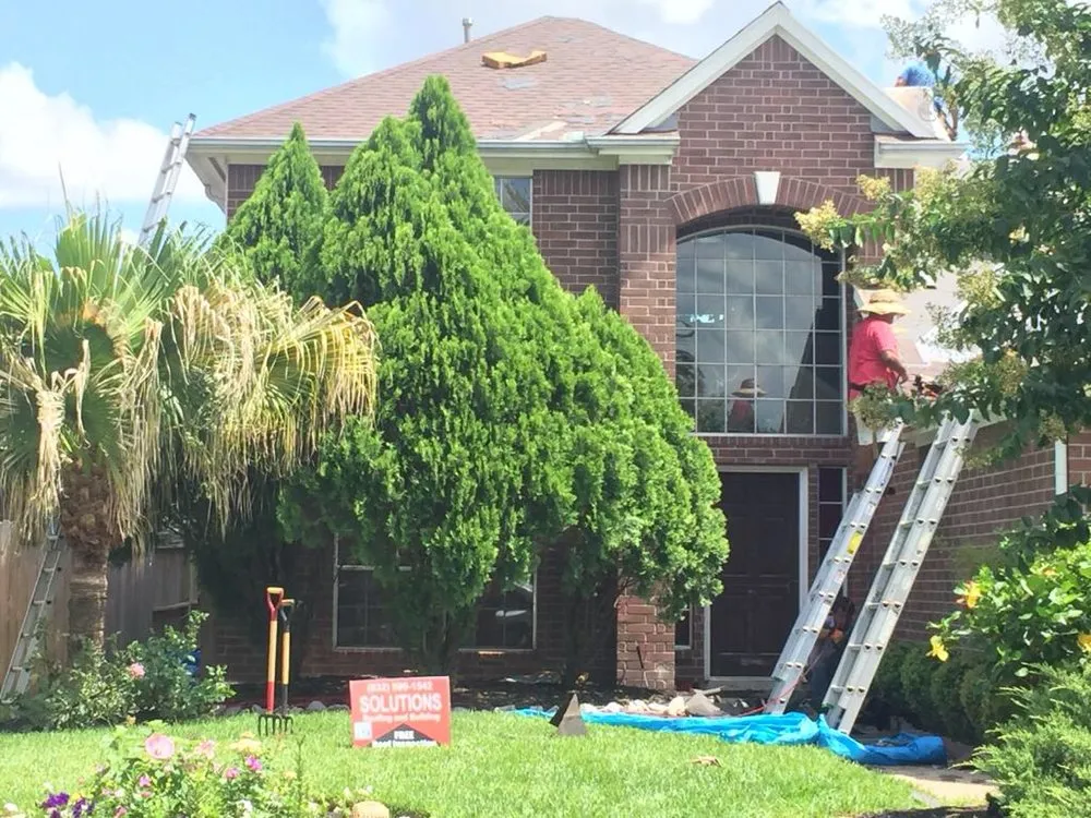 Slide of Solutions Roofing and Building