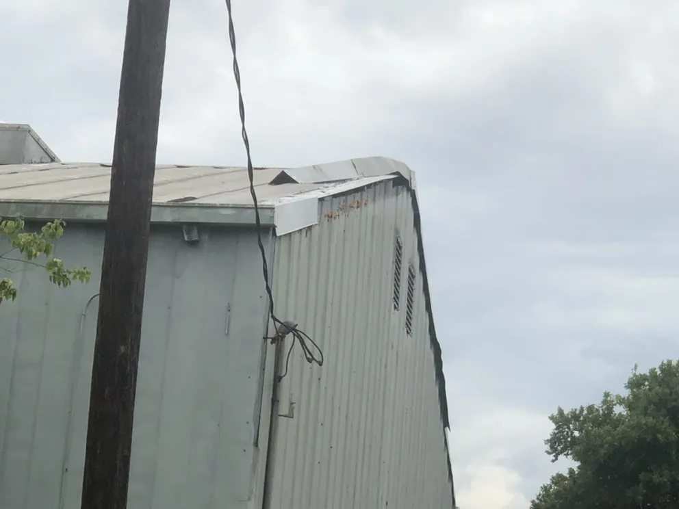 Slide of Solutions Roofing and Building