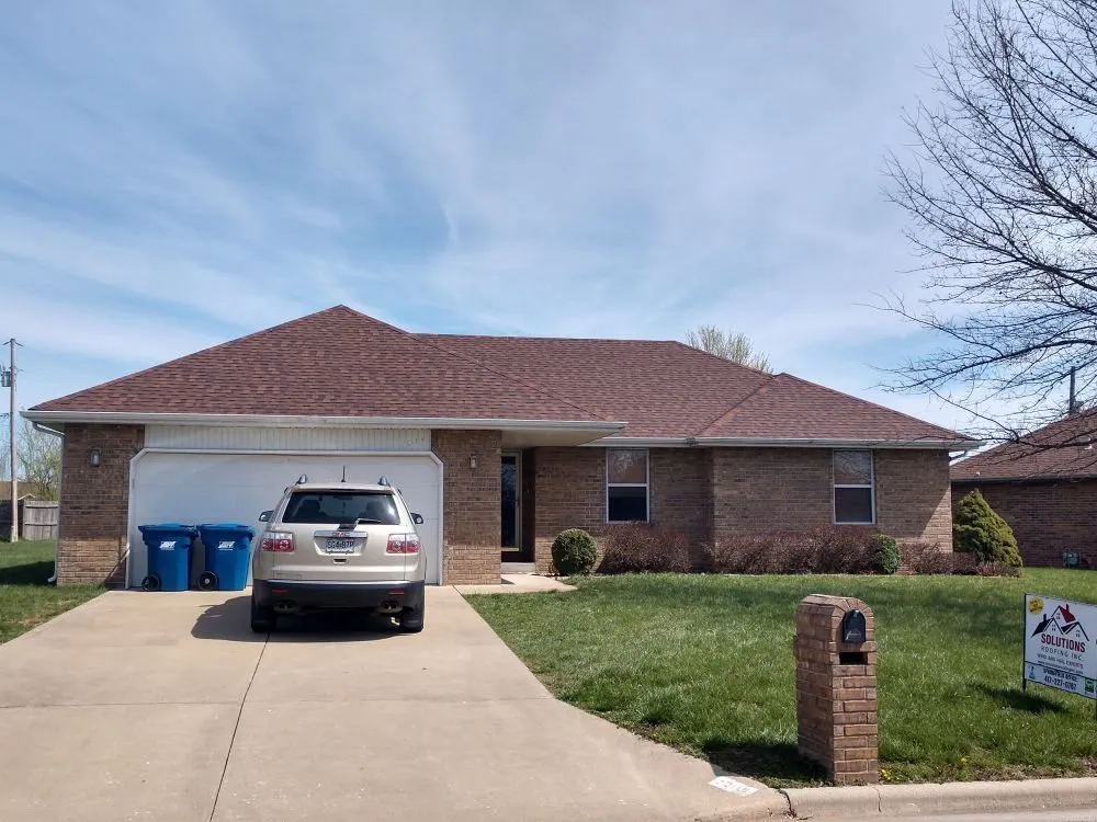 Slide of Solutions Roofing