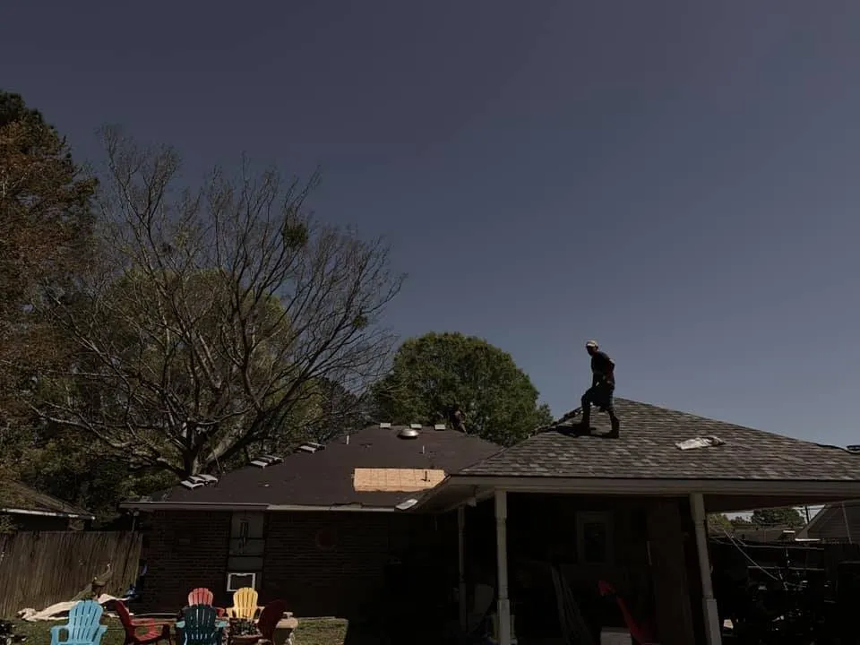 Slide of Songy's Roofing & Contractors