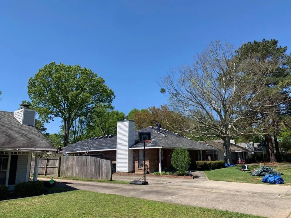 Slide of Songy's Roofing & Contractors