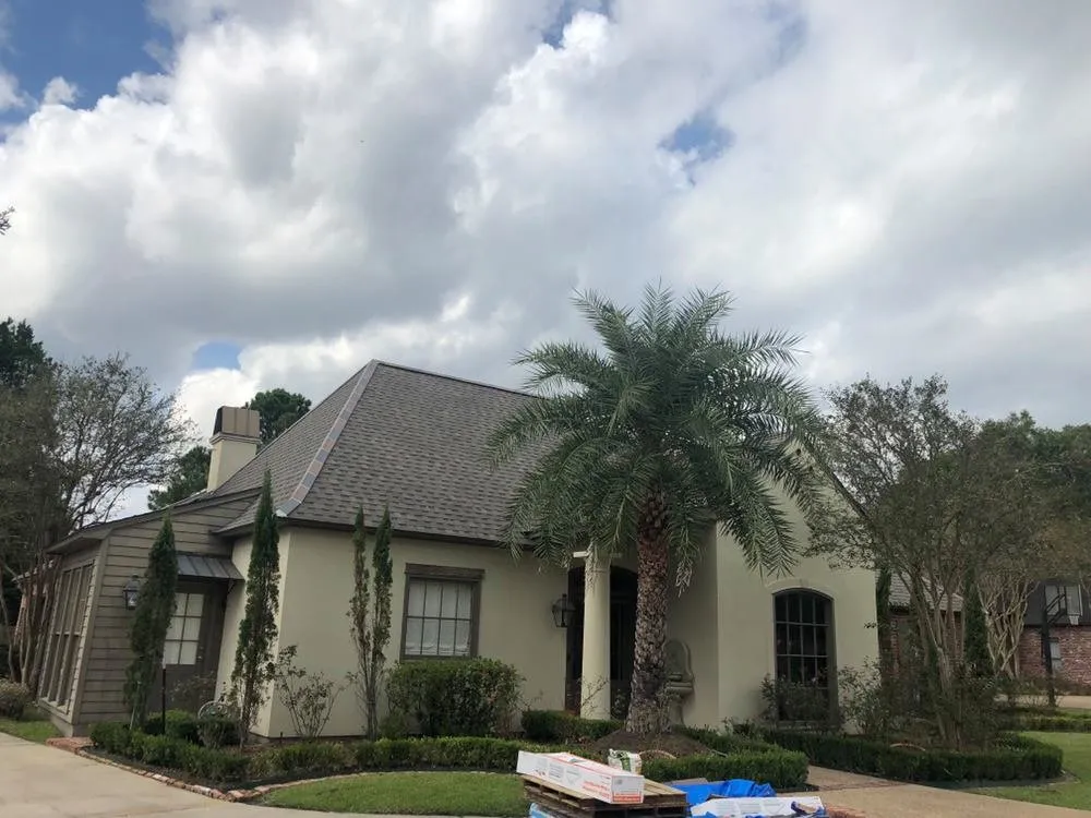 Slide of Songy's Roofing & Contractors