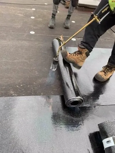 Slide of Sonny’s Roofing