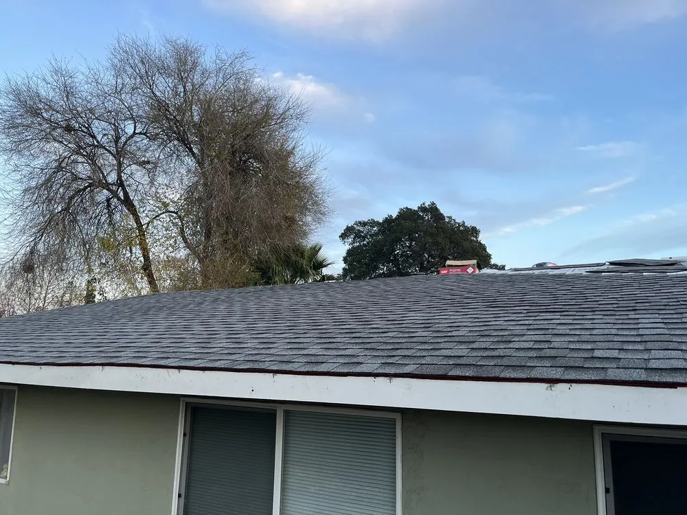 Slide of SOS Roofing