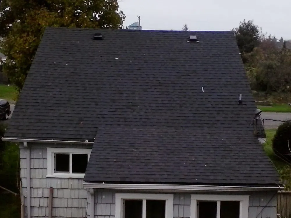 Slide of Sound Roofing and Construction