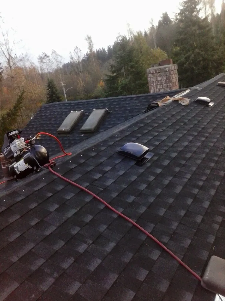 Slide of Sound Roofing and Construction