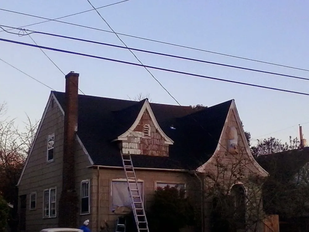 Slide of Sound Roofing and Construction