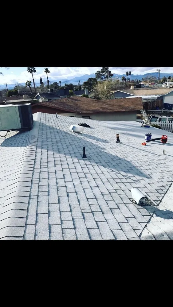 Slide of Source 1 Roofing