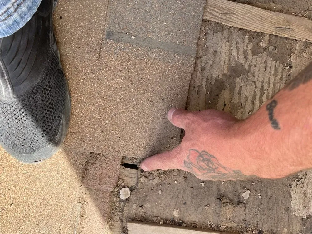 Slide of Source 1 Roofing