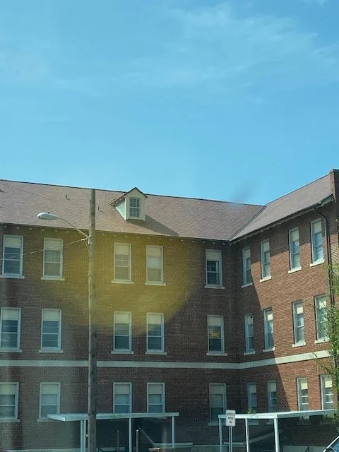 Slide of Source Roofing Consultants