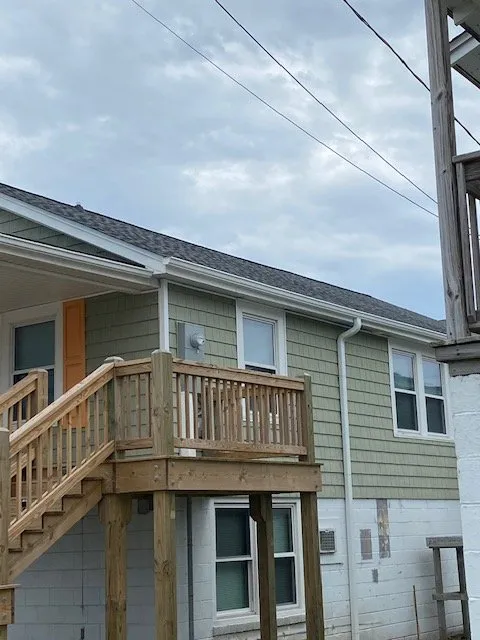 Slide of Source Roofing Consultants