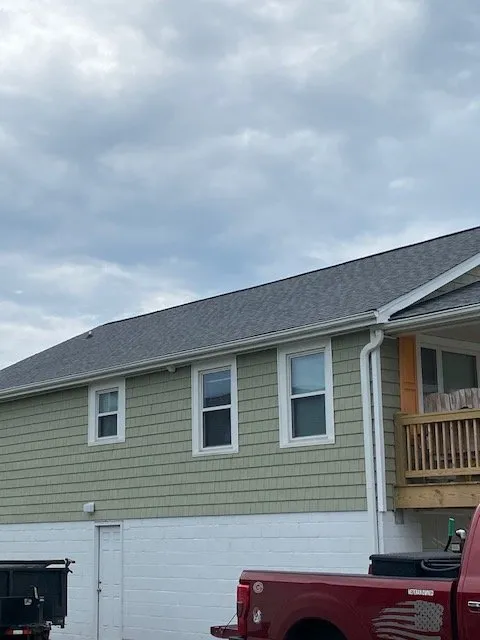 Slide of Source Roofing Consultants