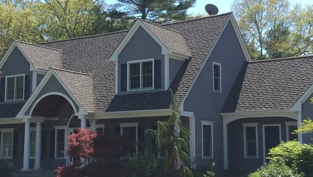 Slide of Sousa Roofing