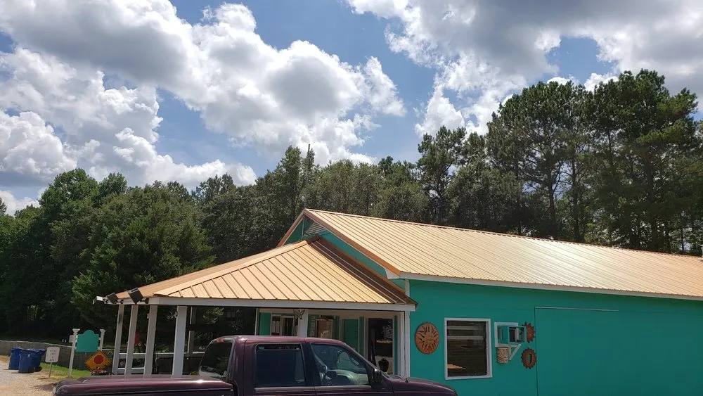 Licensed storm damage roof repair in Muscadine, AL by Southern Shield Roofing
