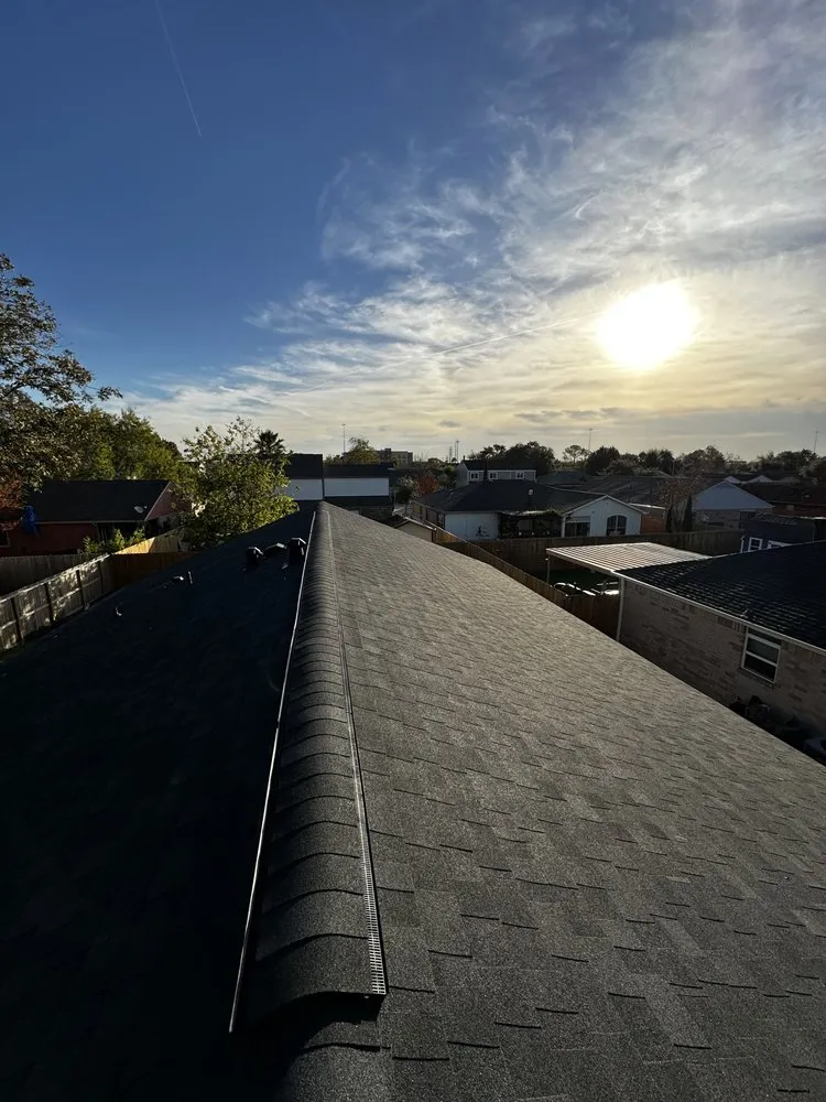 Slide of Space City Roofers