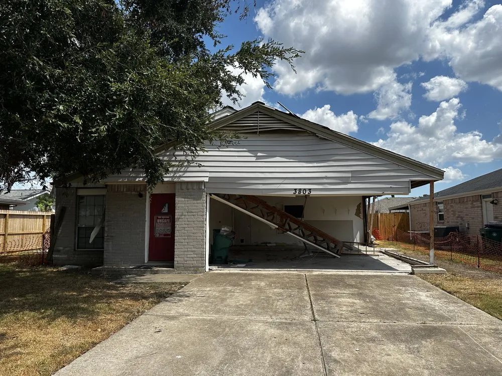 Slide of Space City Roofers