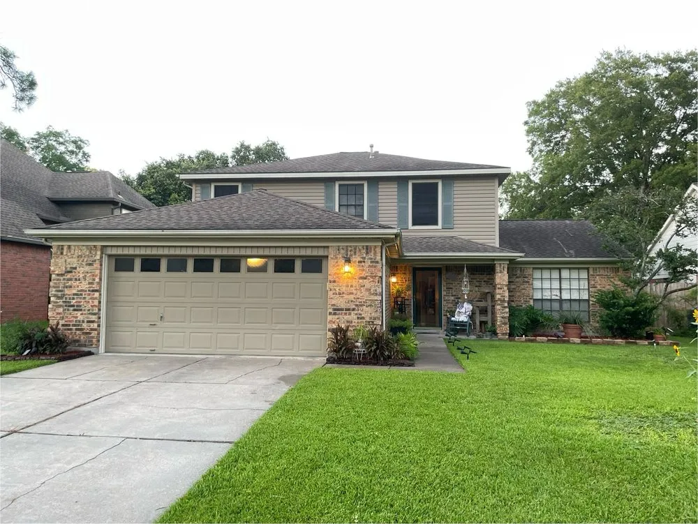 Slide of Space City Roofers