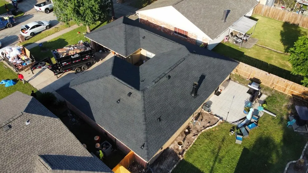 Slide of Space City Roofing & Remodeling