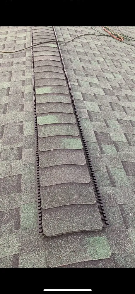 Slide of Space Coast Roofing