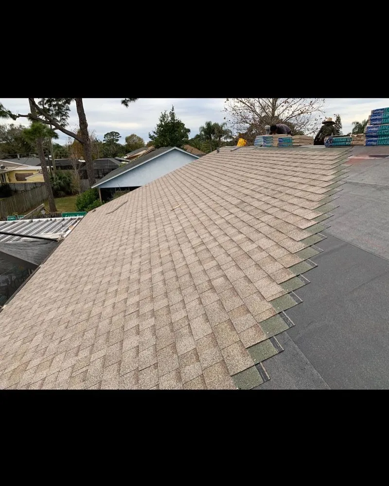 Slide of Space Coast Roofing