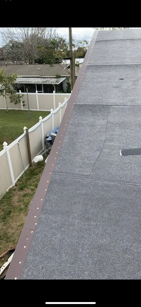 Slide of Space Coast Roofing