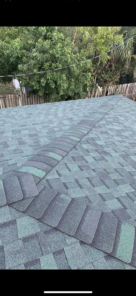 Slide of Space Coast Roofing