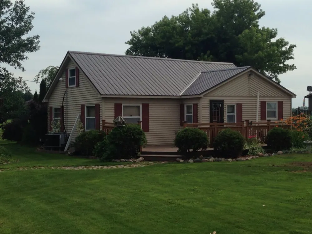 Emergency shingle roofing service in Rhodes, MI by Spartan Metal Works LLC