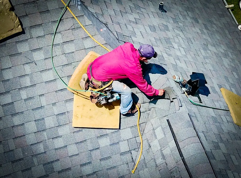 Professional storm damage roof repair in Kingwood, TX by Spartan Roof Construction