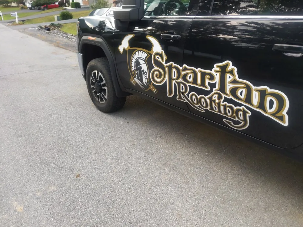 Slide of Spartan Roofing