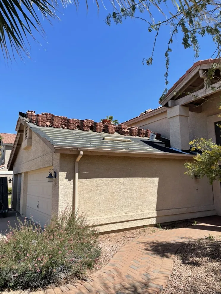 Slide of Spartan Roofing