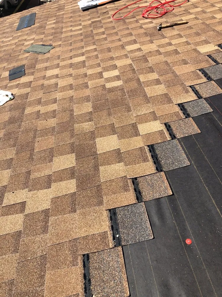 Slide of Spartan Roofing