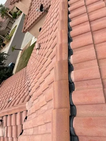 Slide of Spartan Roofing