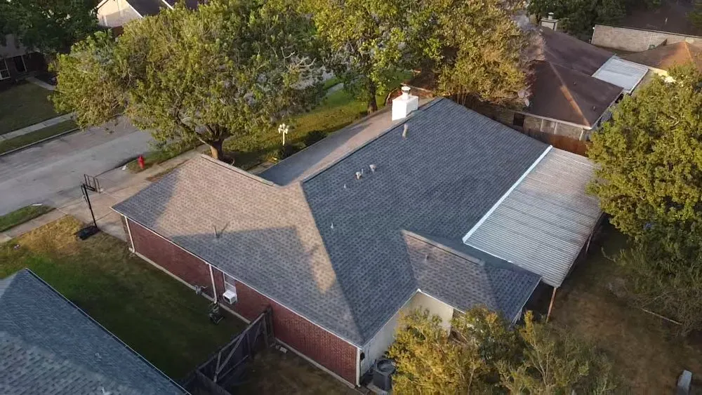 Slide of Spartan Roofing