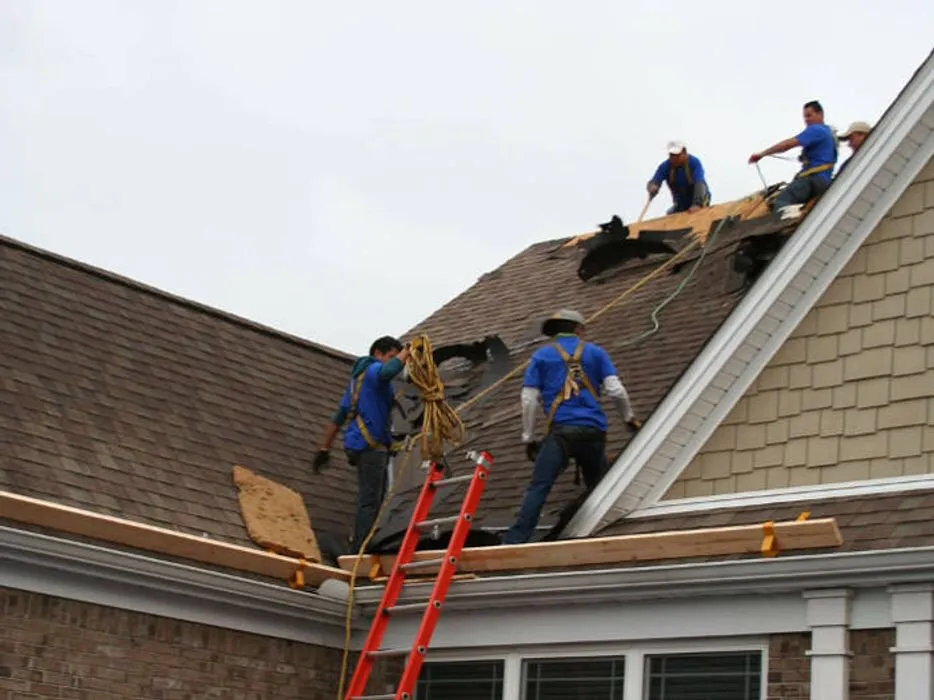 Slide of Spartan Roofing Solutions