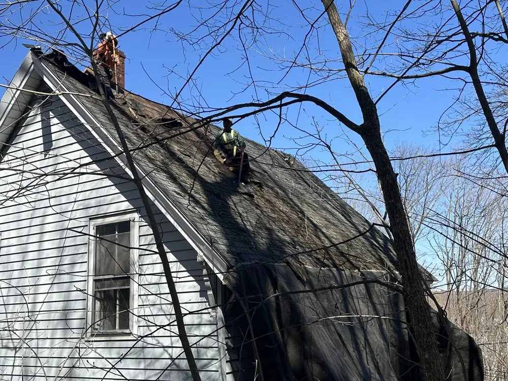 Slide of Spartan Roofing