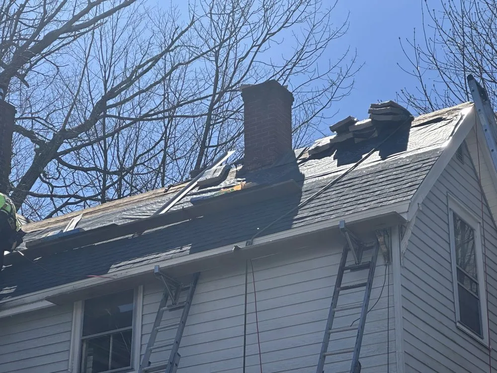 Slide of Spartan Roofing