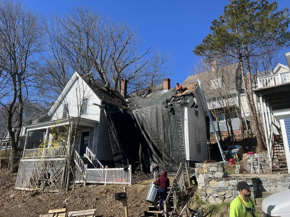 Slide of Spartan Roofing