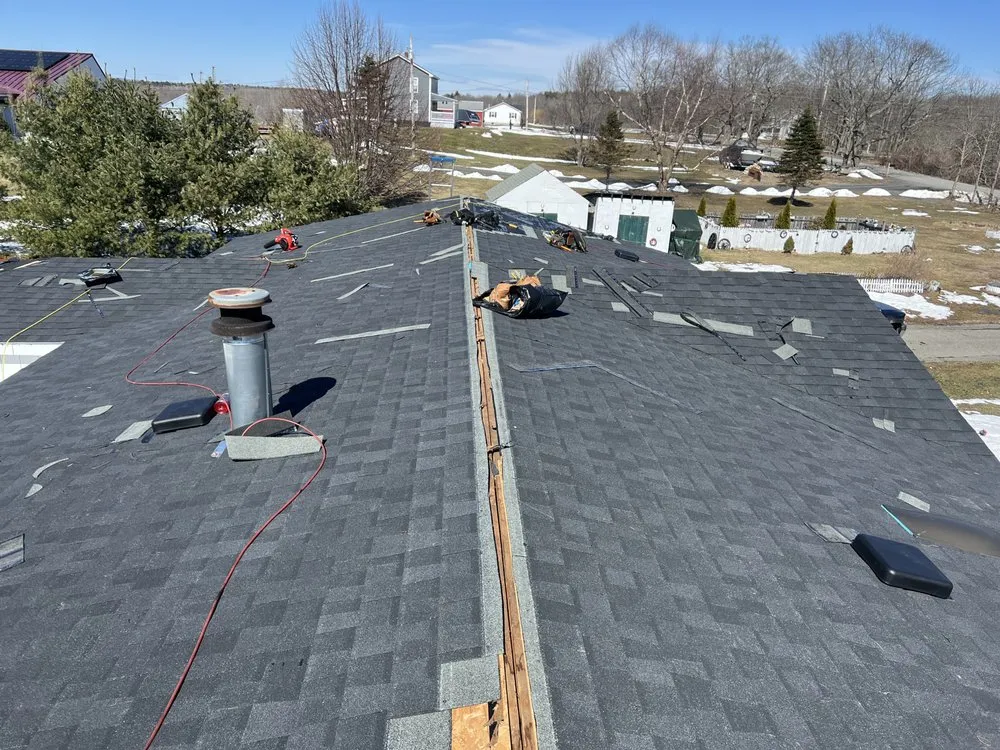 Slide of Spartan Roofing