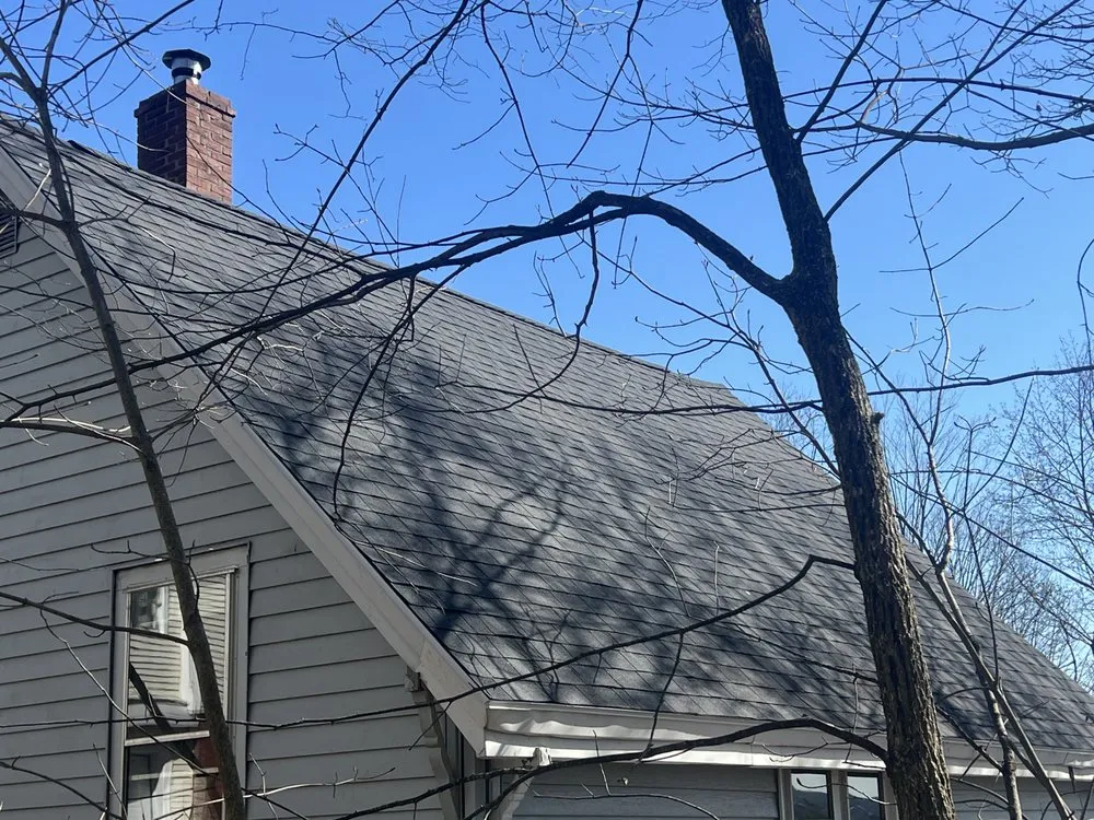 Slide of Spartan Roofing