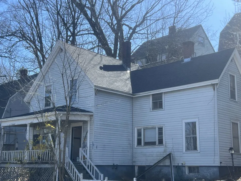 Slide of Spartan Roofing