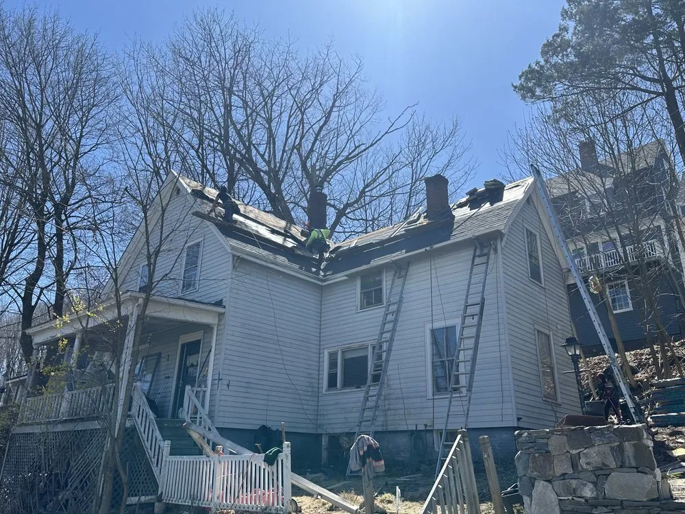 Slide of Spartan Roofing