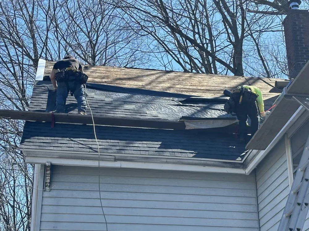 Slide of Spartan Roofing