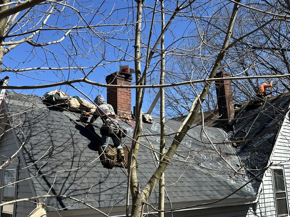 Slide of Spartan Roofing