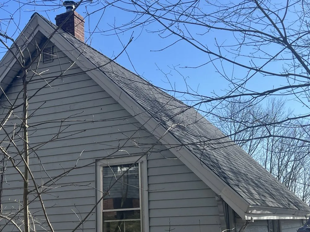 Slide of Spartan Roofing