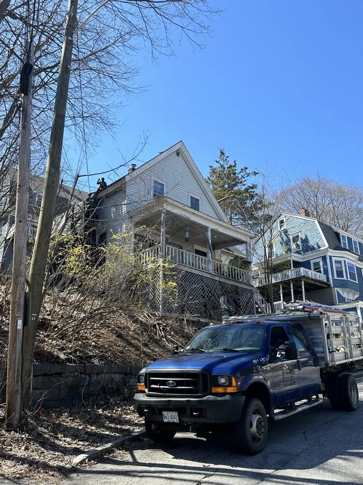 Slide of Spartan Roofing